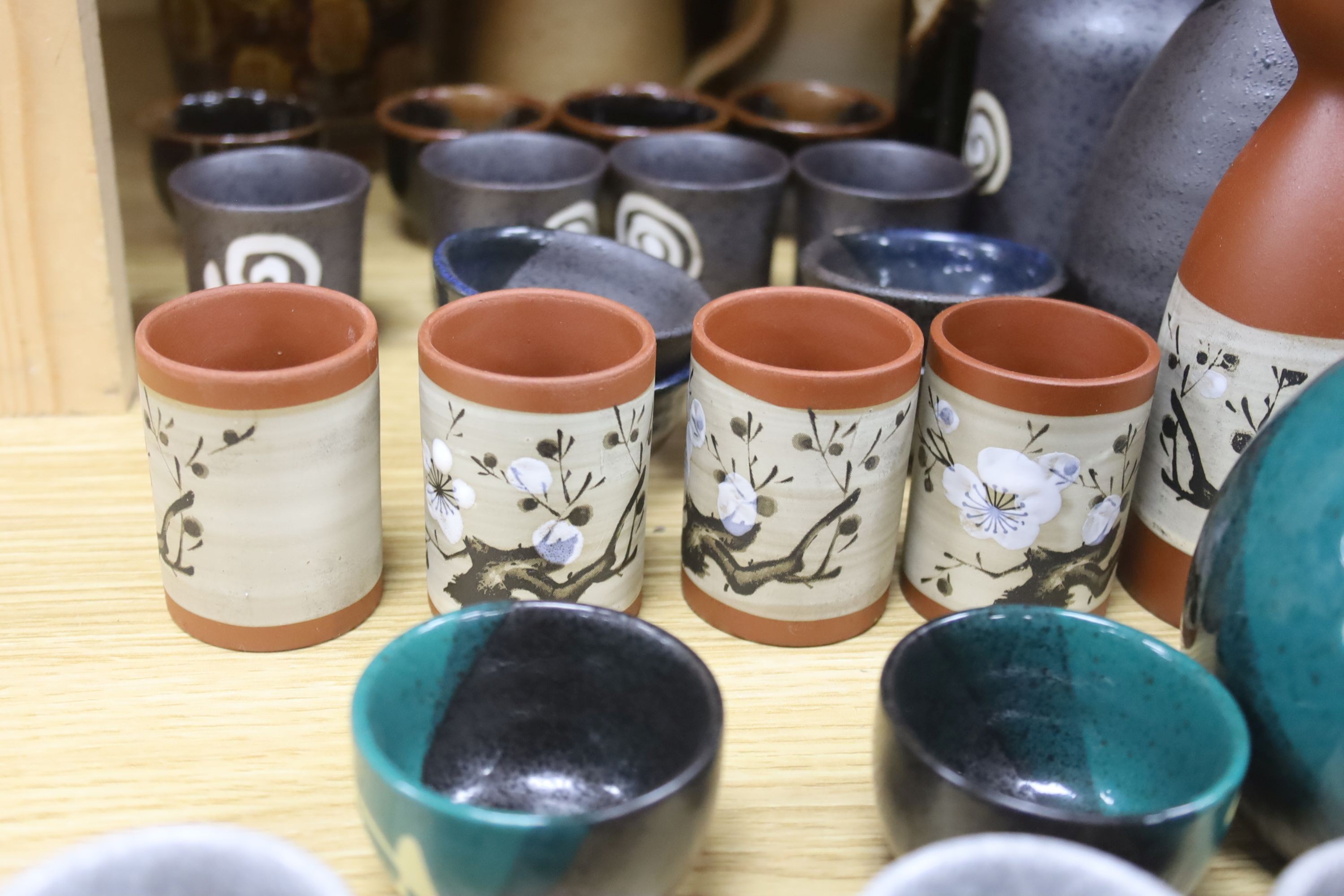 A collection of Studio pottery vases and a Bellarmine